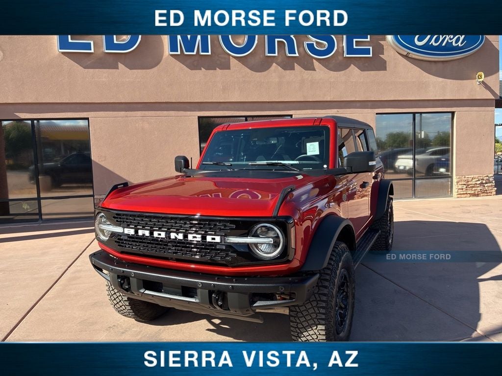 2024 Ford Bronco Wildtrak in Chili Pepper Red — front three-quarter view