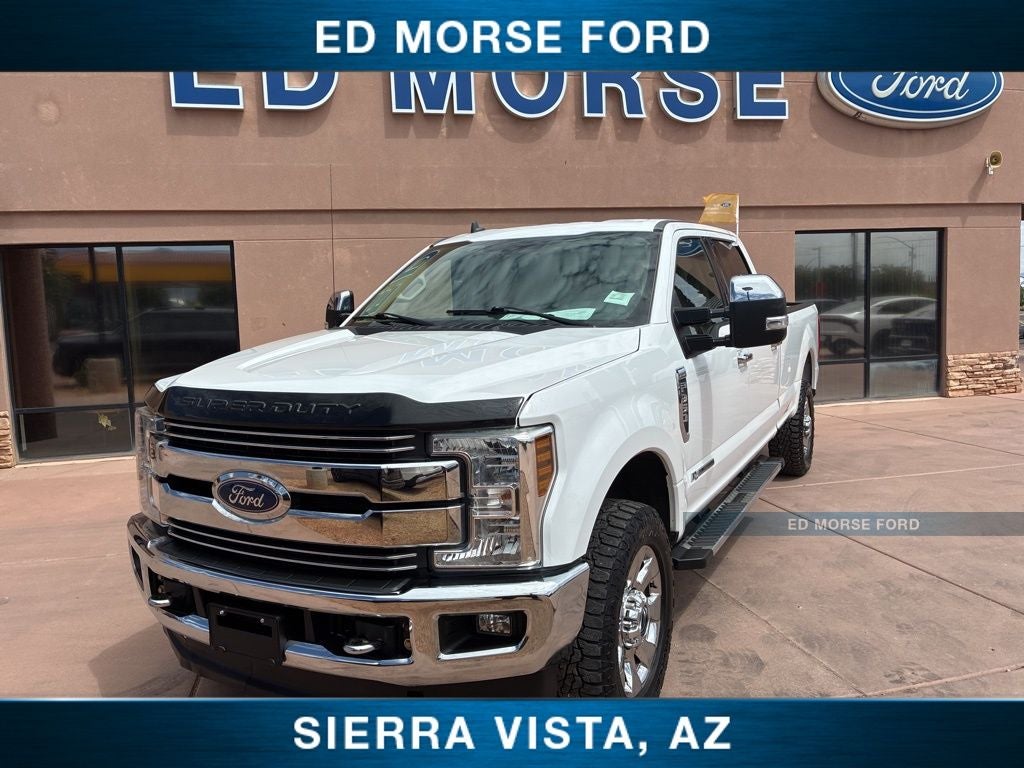 2019 Ford F-350SD Lariat in Oxford White — front three-quarter view